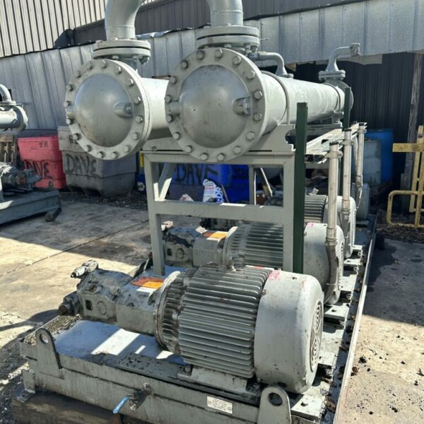 50 HP HYDRAULIC POWER PUMP SKID WITH FOUR 50 HP HYDRAULIC CIRCULATING PUMPS AND TWO HEAT EXCHANGERS.  PREPIPED AND SKIDDED.