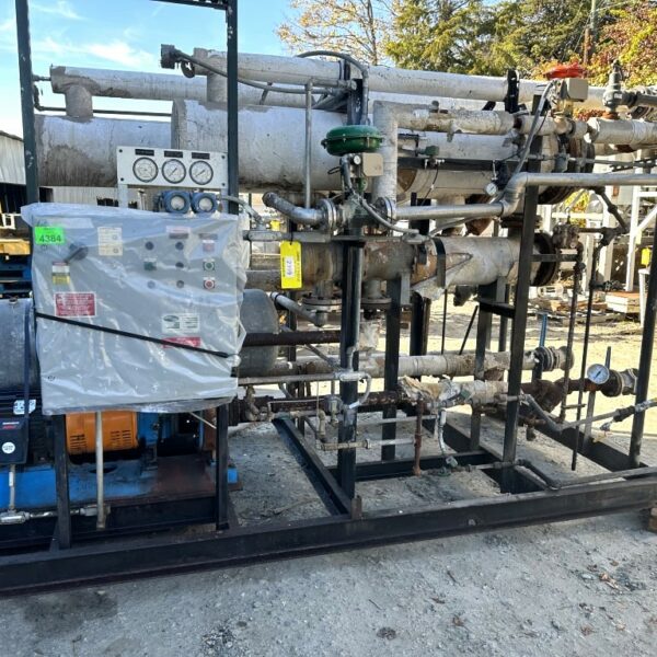 HEAT EXCHANGERS (3) AND PUMP PACKAGE (2), SKID MOUNTED.
