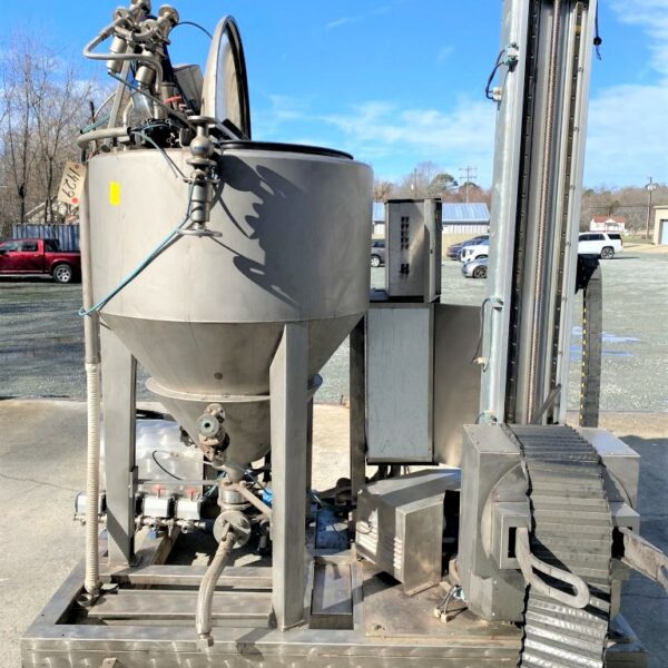 SKID MOUNTED DUMP AND MIX TANK WITH PUMP ASSEMBLY